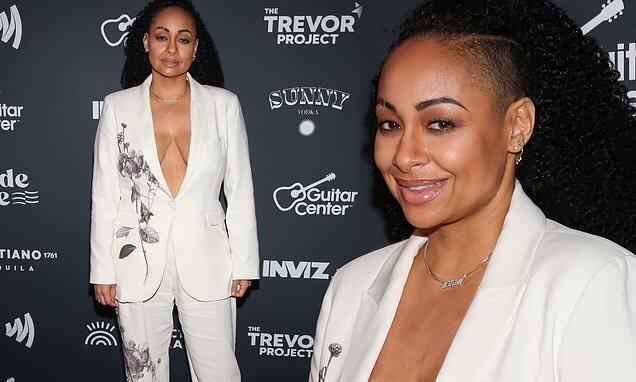 Raven-Symone showcases 40lb weight loss in plunging white pantsuit at Pride Eve celebration in LA | Daily Mail Online