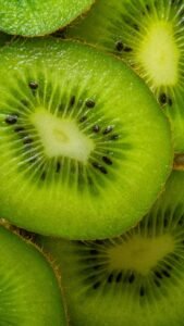Close-up of a kiwifruit sliced in half, a food rich in vitamin C for skin collagen