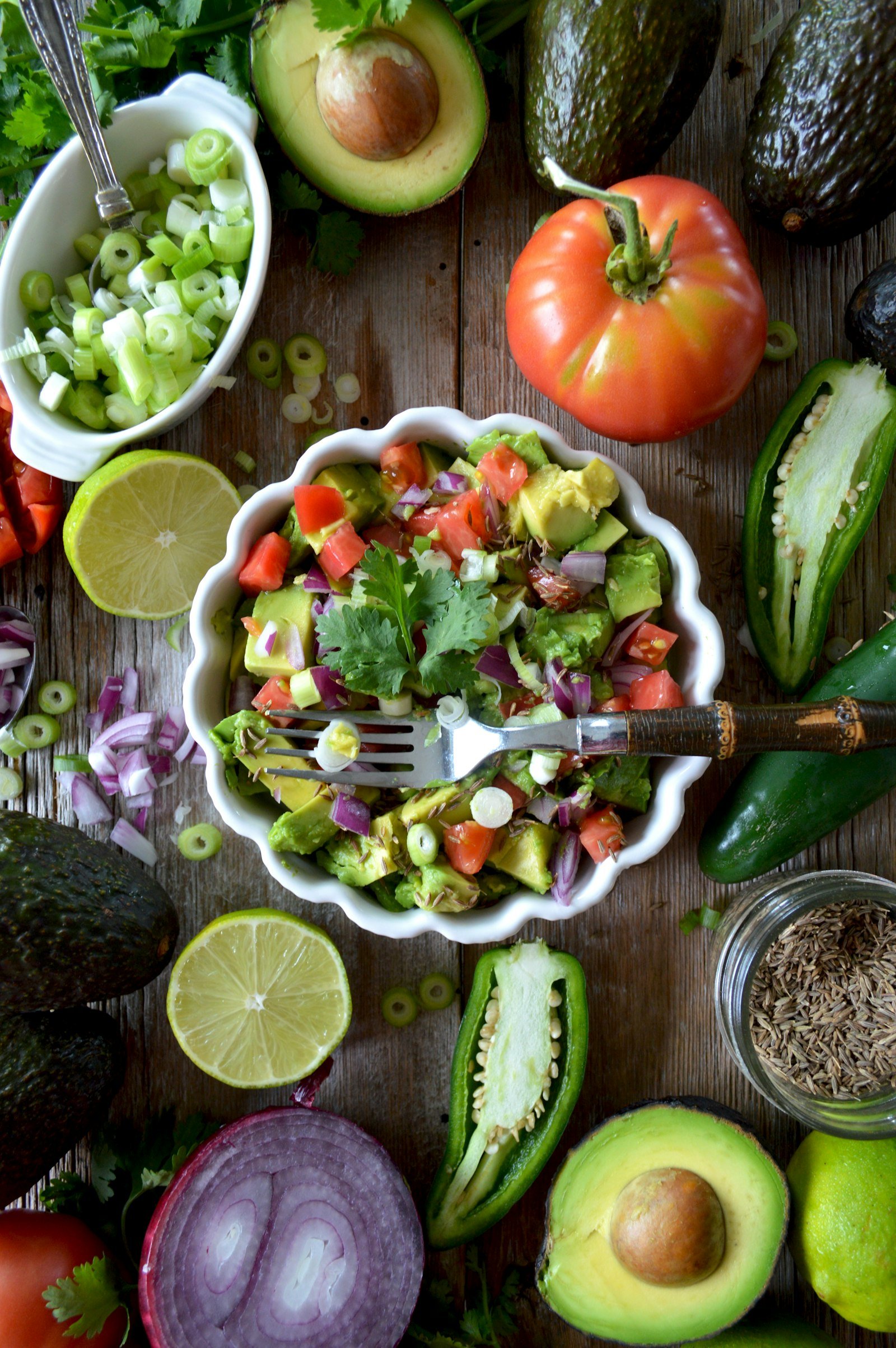 Flat lay of colorful vegetable salad bowls